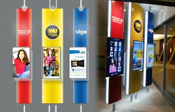 Western Union totems lit in a store aisle